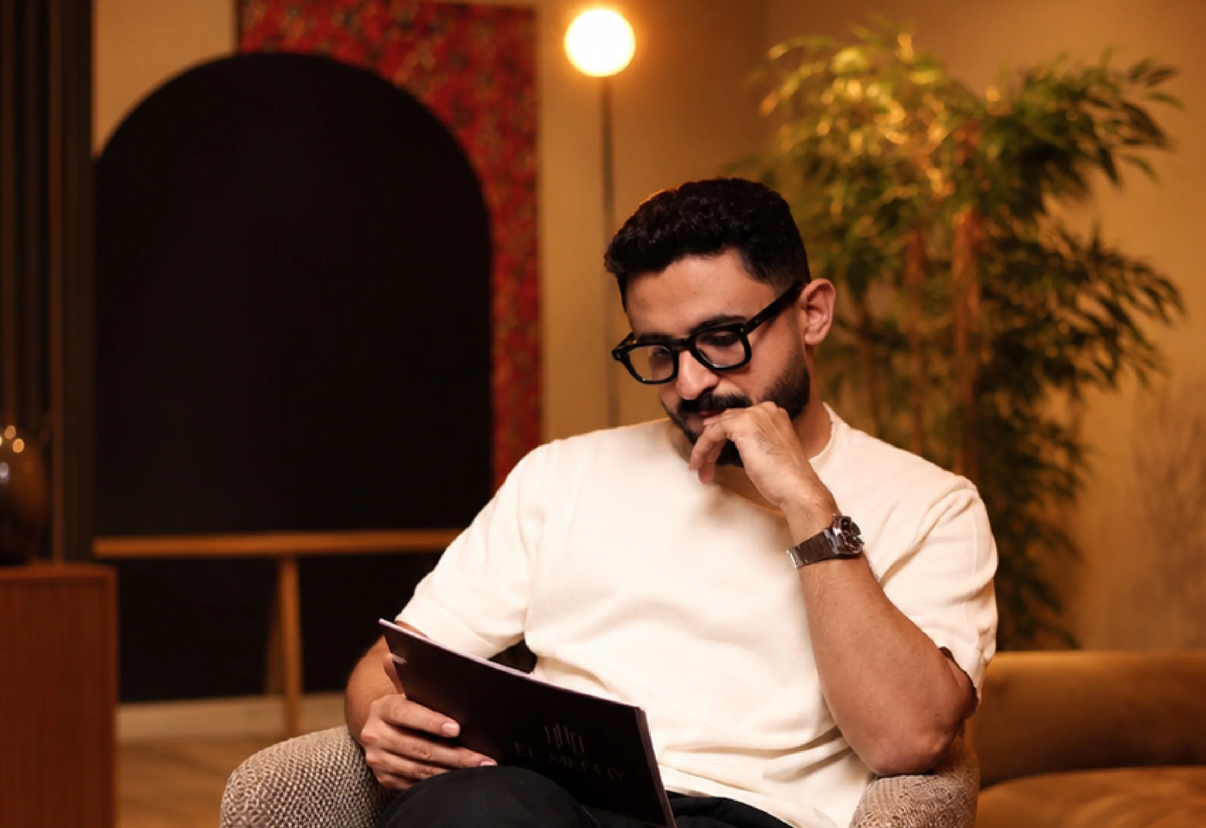 Mohamed Ragab El Meehy, founder and creative director, reviewing a design in the studio